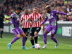 Brentford's Christian Eriksen in action with Tottenham Hotspur's Emerson Royal and Cristian Romero